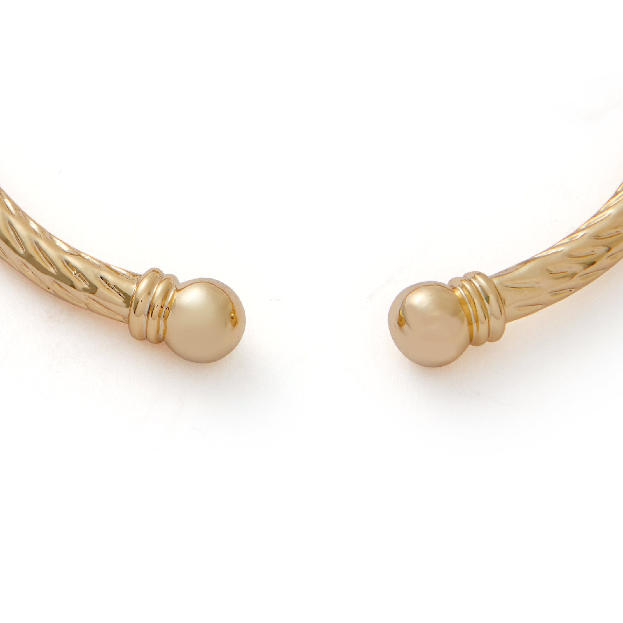Close-up of Gold Ball Torque Bangle in Kids and Adult Sizes